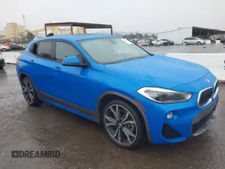2018 BMW X2 sDrive28i with VIN WBXYJ3C36JEB38059, listed as a IAAI auction lot 41725635 with 105,213 mi miles. Bid and sale history available at carsss.com. Image 1.
