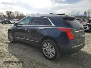 2017 Cadillac XT5 Premium Luxury FWD with VIN 1GYKNCRS5HZ198298, listed as a Copart auction lot 48212495 with 95,648 mi miles and Salvage Title. Bid and sale history available at DreamBid. Image 2.