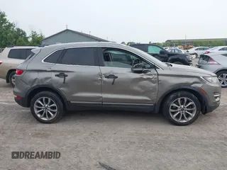 2016 Lincoln MKC Select with VIN 5LMCJ2C97GUJ30711, listed as a IAAI auction lot 42501763 with 118,430 mi miles and . Bid and sale history available at DreamBid. Image 13.