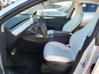 2024 Tesla Model Y Long Range with VIN 7SAYGDEE3RA257999, listed as a Copart auction lot 41838105 with 17,013 mi miles and Salvage Title. Bid and sale history available at DreamBid. Image 7.