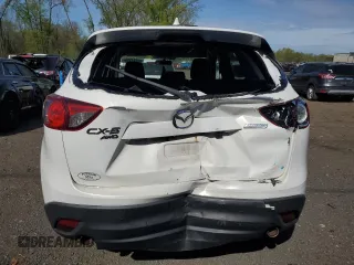 2015 Mazda CX-5 Touring with VIN JM3KE4CYXF0445980, listed as a Copart auction lot 55224355 with 183,713 mi miles and Salvage Title. Bid and sale history available at DreamBid. Image 6.