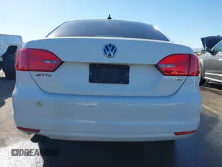 2014 Volkswagen Jetta Sedan SE w/Connectivity with VIN 3VWD07AJ3EM403876, listed as a IAAI auction lot 41209426 with 155,336 mi miles. Bid and sale history available at carsss.com. Image 16.