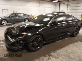 2015 Audi A6 2.0T Premium Plus with VIN WAUGFAFC7FN012983, listed as a IAAI auction lot 41086404 with 145,358 mi miles. Bid and sale history available at carsss.com. Image 2.