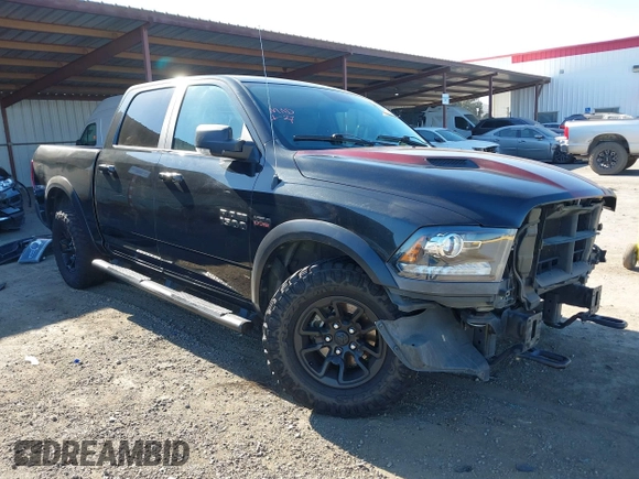 2017 Ram 1500 Rebel z VIN 1C6RR7YT5HS811773, wystawiony jako IAAI lot #41410030 z przebiegiem 96 418 mil mil oraz . Historia ofert i sprzedaży dostępna na DreamBid. Obrazek 1.