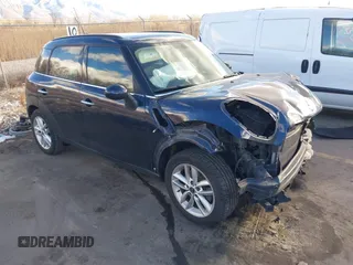 2013 MINI Countryman S z VIN WMWZC3C52DWP21475, wystawiony jako IAAI lot #41215334 z przebiegiem 124 365 mil mil oraz . Historia ofert i sprzedaży dostępna na DreamBid. Obrazek 1.