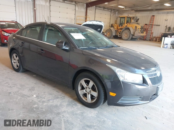 2014 Chevrolet Cruze 1LT with VIN 1G1PC5SB1E7258259, listed as a IAAI auction lot 42143073 with 101,687 mi miles and . Bid and sale history available at DreamBid. Image 1.