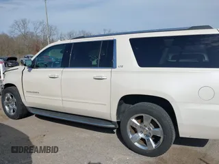 2015 Chevrolet Suburban LTZ with VIN 1GNSCKKC2FR741040, listed as a IAAI auction lot 41709574 with 87,795 mi miles and . Bid and sale history available at DreamBid. Image 14.