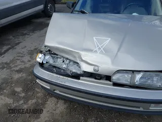 1991 Acura Integra z VIN JH4DB1663MS006848, wystawiony jako IAAI lot #42020171 z przebiegiem 153 978 mil mil oraz . Historia ofert i sprzedaży dostępna na DreamBid. Obrazek 6.