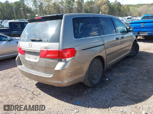 2010 Honda Odyssey LX with VIN 5FNRL3H25AB018051, listed as a IAAI auction lot 41886393 with 256,554 mi miles. Bid and sale history available at carsss.com. Image 4.