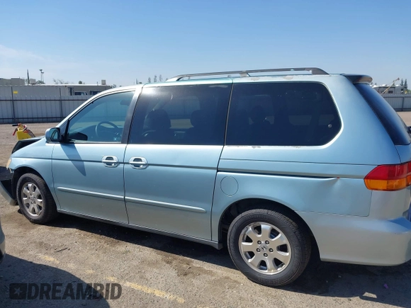 2003 Honda Odyssey EX-L with VIN 5FNRL18973B148675, listed as a IAAI auction lot 41992952 with 232,013 mi miles and . Bid and sale history available at DreamBid. Image 14.