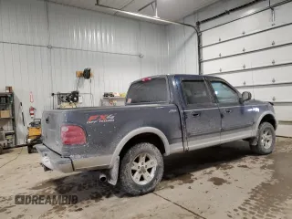 2002 Ford F-150 XLT with VIN 1FTRW08L12KE11970, listed as a Copart auction lot 45299665 with 173,802 mi miles and Salvage Title. Bid and sale history available at carsss.com. Image 3.