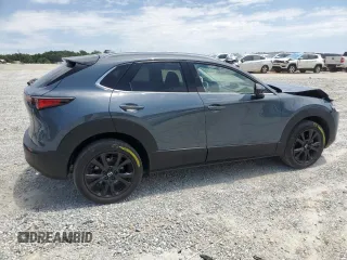 2023 Mazda CX-30 Premium with VIN 3MVDMBDY1PM509621, listed as a Copart auction lot 58316715 with 27,979 mi miles and Salvage title. Bid and sale history available at DreamBid. Image 3.