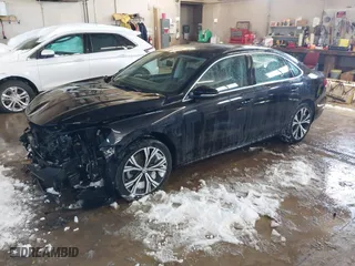 2022 Volkswagen Passat 2.0T SE with VIN 1VWSA7A31NC003418, listed as a IAAI auction lot 41608219 with 76,591 mi miles. Bid and sale history available at carsss.com. Image 17.