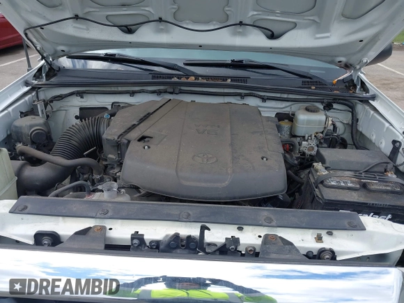 2015 Toyota Tacoma with VIN 5TFLU4EN6FX120947, listed as a IAAI auction lot 42043239 with 125,480 mi miles and . Bid and sale history available at DreamBid. Image 10.