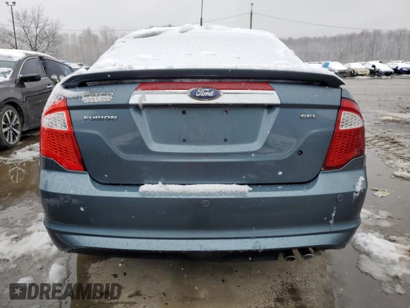 2012 Ford Fusion SEL z VIN 3FAHP0JA7CR300456, wystawiony jako Copart lot #44750125 z przebiegiem 144 788 mil mil oraz Szkoda całkowita • Salvage title. Historia ofert i sprzedaży dostępna na DreamBid. Obrazek 6.