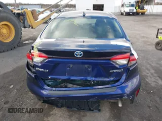 2021 Toyota Corolla Hybrid LE with VIN JTDEAMDE9MJ021431, listed as a IAAI auction lot 41747142 with 165,680 mi miles. Bid and sale history available at carsss.com. Image 16.