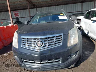 2014 Cadillac SRX Premium Collection z VIN 3GYFNDE34ES581728, wystawiony jako IAAI lot #41578226 z przebiegiem 121 118 mil mil oraz . Historia ofert i sprzedaży dostępna na DreamBid. Obrazek 13.