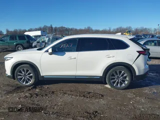 2023 Mazda CX-9 Grand Touring with VIN JM3TCBDY4P0633456, listed as a IAAI auction lot 41510127 with 24,706 mi miles and . Bid and sale history available at carsss.com. Image 14.