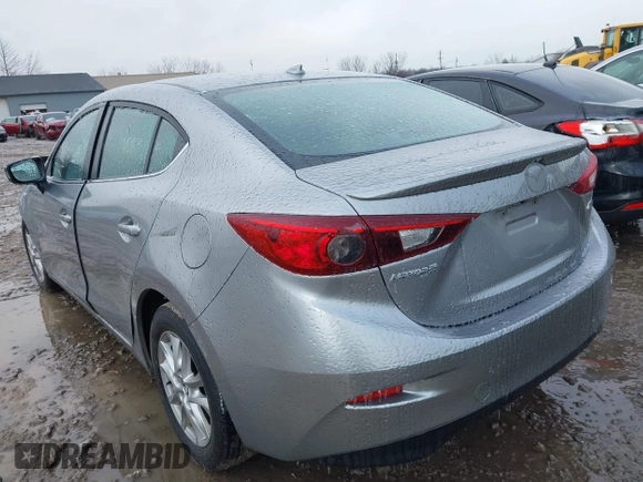 2015 Mazda 3 i Grand Touring with VIN JM1BM1W79F1256535, listed as a IAAI auction lot 41474347 with 128,573 mi miles and . Bid and sale history available at DreamBid. Image 3.
