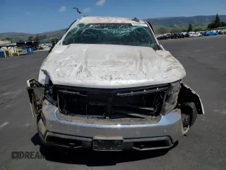 2021 Chevrolet Silverado 1500 LT with VIN 3GCUYDET6MG206476, listed as a Copart auction lot 53552215 with 130,103 mi miles and Salvage Title. Bid and sale history available at carsss.com. Image 5.