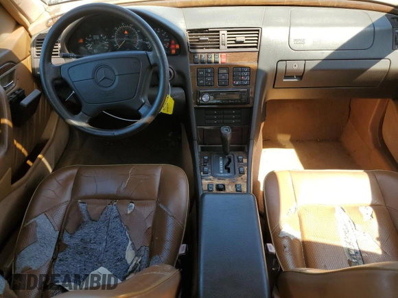 1995 Mercedes-Benz C with VIN WDBHA28E7SF255142, listed as a Copart auction lot 68411704 with 334,000 mi miles and Salvage Title. Bid and sale history available at carsss.com. Image 8.