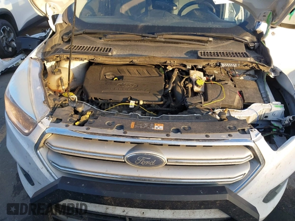 2018 Ford Escape SE z VIN 1FMCU9GD6JUC13023, wystawiony jako IAAI lot #41023197 z przebiegiem 105 489 mil mil oraz . Historia ofert i sprzedaży dostępna na DreamBid. Obrazek 10.