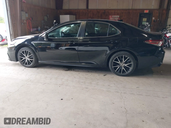 2021 Toyota Camry SE Nightshade with VIN 4T1G11AK6MU580771, listed as a IAAI auction lot 40042967 with 106,579 mi miles. Bid and sale history available at carsss.com. Image 14.