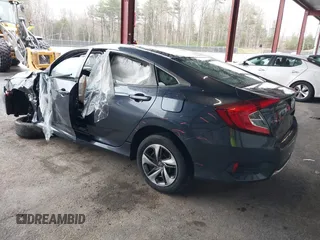 2019 Honda Civic Sedan LX with VIN 19XFC2F6XKE201052, listed as a IAAI auction lot 41961558 with 94,149 mi miles. Bid and sale history available at carsss.com. Image 3.