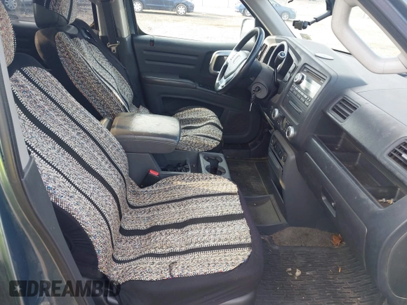 2006 Honda Ridgeline RTL with VIN 2HJYK16526H531884, listed as a IAAI auction lot 42796524 with 334,489 mi miles and . Bid and sale history available at DreamBid. Image 5.