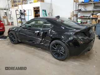 2023 Toyota GR86 Premium with VIN JF1ZNBF11P8760055, listed as a Copart auction lot 79257594 with 10,603 mi miles and Salvage Title. Bid and sale history available at carsss.com. Image 2.