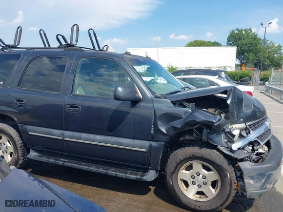 2004 Chevrolet Tahoe LT with VIN 1GNEC13Z04J134981, listed as a IAAI auction lot 39886652 with 244,056 mi miles. Bid and sale history available at carsss.com. Image 14.