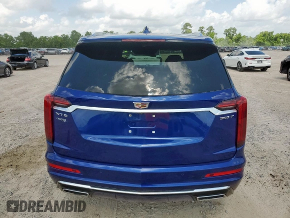 2023 Cadillac XT6 FWD Luxury с VIN 1GYKPAR42PZ167668, выставлен на аукционе Copart как лот 62093575 с пробегом 32 212 миль миль и Списание • Salvage title. История ставок и продаж доступна на DreamBid. Изображение 6.
