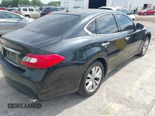 2011 Infiniti M37 with VIN JN1BY1AR7BM370266, listed as a IAAI auction lot 42074141 with 114,470 mi miles. Bid and sale history available at carsss.com. Image 4.