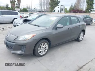 2012 Mazda Mazda3 i Touring with VIN JM1BL1L82C1696088, listed as a IAAI auction lot 41872228 with 111,629 mi miles. Bid and sale history available at carsss.com. Image 2.