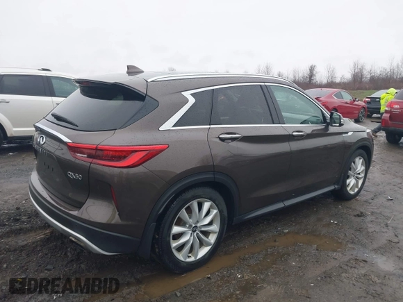 2019 Infiniti QX50 Luxe with VIN 3PCAJ5M32KF118638, listed as a IAAI auction lot 42019300 with 89,568 mi miles and . Bid and sale history available at DreamBid. Image 4.