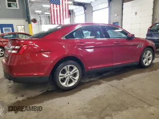2016 Ford Taurus SEL with VIN 1FAHP2E81GG125802, listed as a Copart auction lot 62491045 with 99,704 mi miles and Salvage title. Bid and sale history available at DreamBid. Image 3.