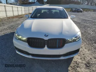 2017 BMW 7 Series 740i with VIN WBA7E2C32HG740649, listed as a Copart auction lot 45593145 with 122,793 mi miles and Salvage Title. Bid and sale history available at carsss.com. Image 5.