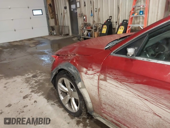2013 Audi allroad A6 V8 with VIN WA1UFBFL0DA235358, listed as a IAAI auction lot 41323163 with 143,129 mi miles and . Bid and sale history available at DreamBid. Image 6.