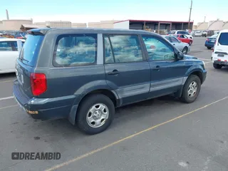 2004 Honda Pilot LX with VIN 2HKYF18114H591405, listed as a IAAI auction lot 42386073 with 71,295 mi miles and . Bid and sale history available at DreamBid. Image 4.