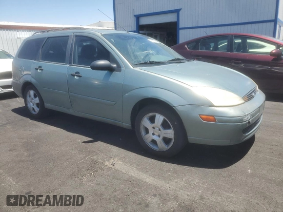2004 Ford Focus SE with VIN 1FAFP36384W191801, listed as a Copart auction lot 63661465 with 144,226 mi miles and Salvage title. Bid and sale history available at DreamBid. Image 4.