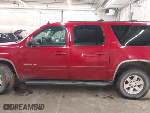 2013 GMC Yukon XL SLT z VIN 1GKS2KE75DR333420, wystawiony jako IAAI lot #41712106 z przebiegiem 234 473 mil mil oraz . Historia ofert i sprzedaży dostępna na DreamBid. Obrazek 14.