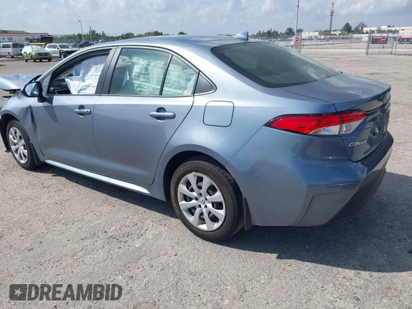 2023 Toyota Corolla Hybrid LE with VIN JTDBCMFE8PJ010693, listed as a IAAI auction lot 41736641 with 10,751 mi miles. Bid and sale history available at carsss.com. Image 3.