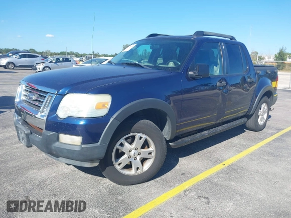 2007 Ford Explorer Sport Trac XLT z VIN 1FMEU31K57UA25387, wystawiony jako IAAI lot #41839716 z przebiegiem 199 004 mil mil oraz . Historia ofert i sprzedaży dostępna na DreamBid. Obrazek 2.