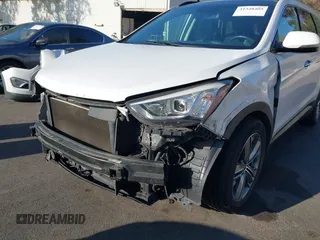 2016 Hyundai Santa Fe SE with VIN KM8SR4HF1GU141799, listed as a IAAI auction lot 41348405 with 99,884 mi miles. Bid and sale history available at carsss.com. Image 18.