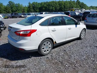 2012 Ford Focus SE with VIN 1FAHP3F27CL218986, listed as a IAAI auction lot 42633997 with 163,414 mi miles and . Bid and sale history available at DreamBid. Image 4.