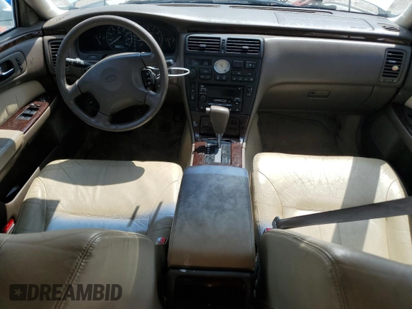 1999 Infiniti Q45 z VIN JNKBY31A2XM603477, wystawiony jako Copart lot #64216924 z przebiegiem 278 602 mil mil oraz Szkody całkowita. Historia ofert i sprzedaży dostępna na DreamBid. Obrazek 8.