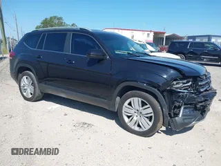 2019 Volkswagen Atlas SE z VIN 1V2WR2CA1KC502998, wystawiony jako IAAI lot #42000445 z przebiegiem 57 690 mil mil oraz . Historia ofert i sprzedaży dostępna na DreamBid. Obrazek 1.
