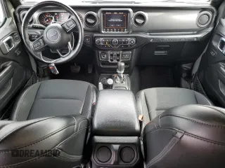 2021 Jeep Wrangler Unlimited Freedom with VIN 1C4HJXDN4MW672340, listed as a Copart auction lot 49406695 with 48,832 mi miles and Salvage title. Bid and sale history available at DreamBid. Image 8.