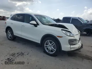2012 Porsche Cayenne with VIN WP1AA2A23CLA02615, listed as a Copart auction lot 64604655 with 131,536 mi miles and Salvage title. Bid and sale history available at DreamBid. Image 4.