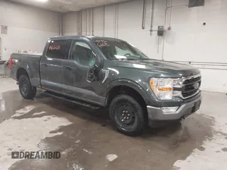2021 Ford F-150 XL with VIN 1FTFW1E59MKD82204, listed as a IAAI auction lot 41466186 with 56,839 mi miles. Bid and sale history available at carsss.com. Image 1.